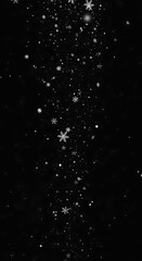 Obraz premium Snowflakes Falling Against Dark Background.