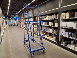Metal mobile ladder for employees in a household goods supermarket © Harmony Video Pro