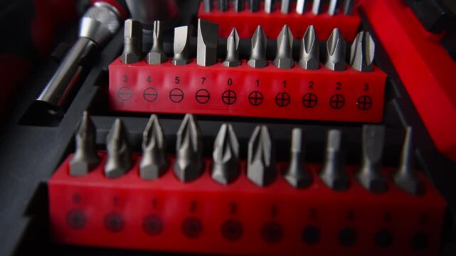 Close up shot of a professional tool kit with screwdriver bits and sockets neatly organized