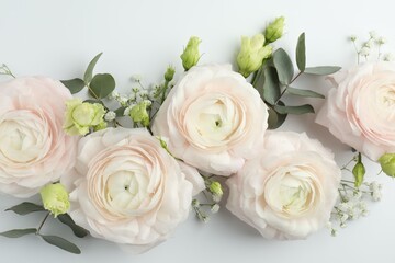 Obraz premium Beautiful ranunculuses and roses on white background, flat lay