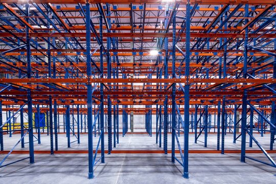 Interior of modern warehouse with empty racking system design for cold storage