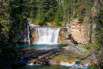 Obraz premium Small waterfall in the Johnston Canyon in Banff National Park, Alberta, Canada