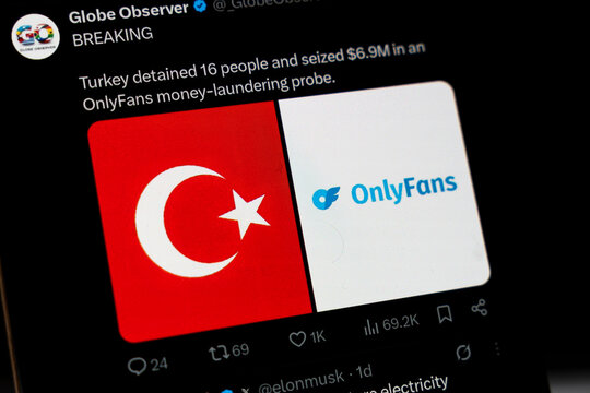 Warsaw, Poland - Feb 24, 2026: Turkish flag and OnlyFans logo on smartphone screen, symbolizing the impact of the online platform in current events.
