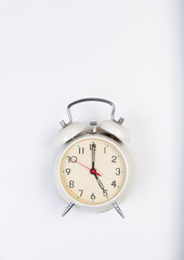 Vintage Alarm Clock Set to Five in the Morning.