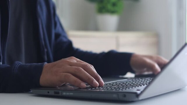 2FA Cyber security protection concept. Businessman working on a laptop to login password two-step authentication, verification code on smartphone screen for identity identification for online banking.