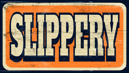 Aged retro slippery sign on wood