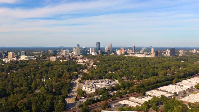 Aerial view of Buckhead downtown city landscape in Atlanta with skyscraper buildings. Urban growth, transportation infrastructure and modern American metropolis.