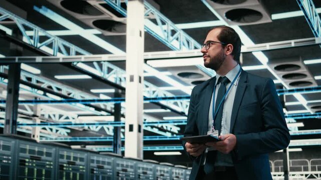 Upgrading systems, tablet and software developer in data center using augmented reality to install server racks. Monitoring server hub, VFX overlay and employee using device automation app, camera A