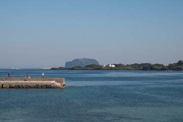 Seongsan Ilchulbong and harbor view in Jeju Island, South Korea