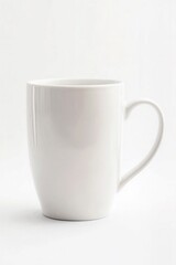 Obraz premium A plain ceramic mug tilted slightly on solid white background, glaze imperfections.