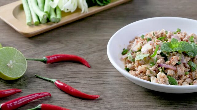 Thai spicy minced pork salad or laab moo in Isan Thai food style