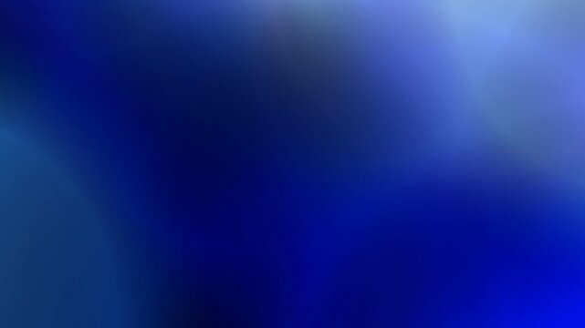 Soft blue abstract gradient background with gentle light haze