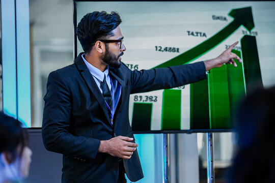 Sales director analyzing conversion funnel metrics on green bar chart. Marketing manager evaluating customer acquisition cost efficiency strategies.