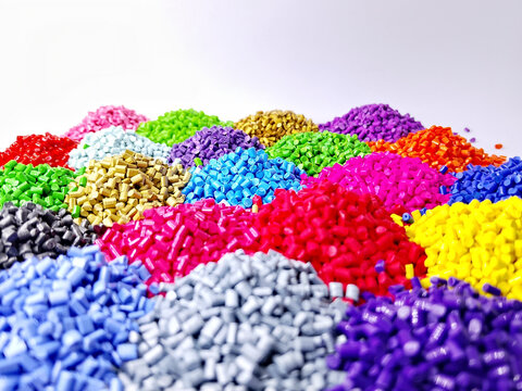 Colorful masterbatch granule, mix color polypropylene polymer granules, cold cutting type granule texture, isolated on white background, for industrial plastic company profile product catalog design