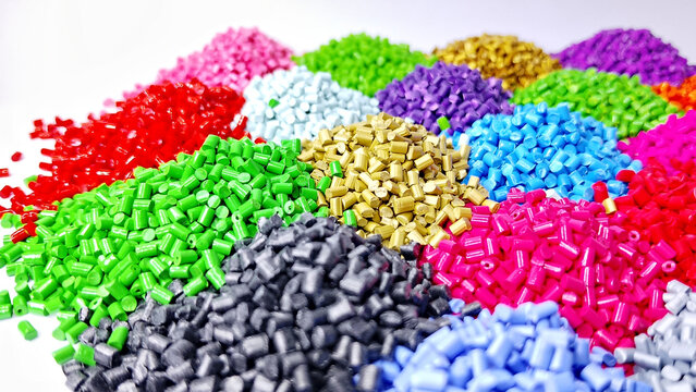 Colorful masterbatch granule, mix color polypropylene polymer granules, cold cutting type granule texture, isolated on white background, for industrial plastic company profile product catalog design