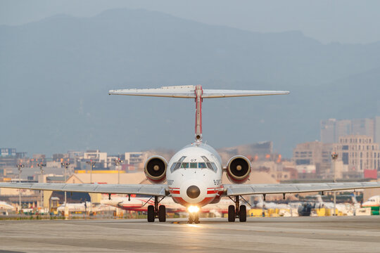Taipei, Taiwan - 2018 April 18: A Far Eastern Air Transport McDonnell Douglas MD-82 aircraft (registration B-28007) taxis on the taxiway at Taipei Songshan Airport.