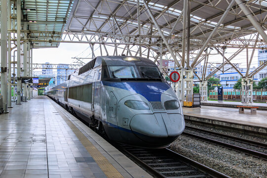 Seoul, South Korea - 2025 July 05: A Korea Train eXpress (KTX) high-speed train stopped at the platform of Seoul Station.