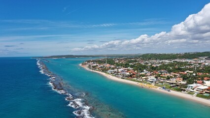 Fototapeta premium Fantastic aerial view of Barra de Sao Miguel beach on a sunny summer day in February 2026 near Maceio City. Alagoas State, Brazil 