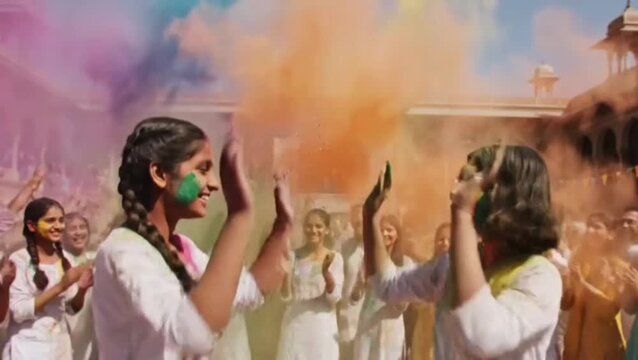 Girls playing Indian Festival Holi Celebration Slow motion

