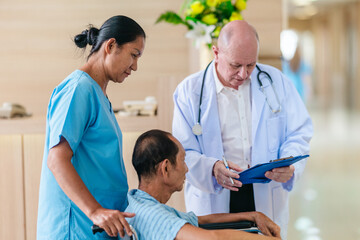 Obraz premium Medical Team Assisting Male Patient in Wheelchair