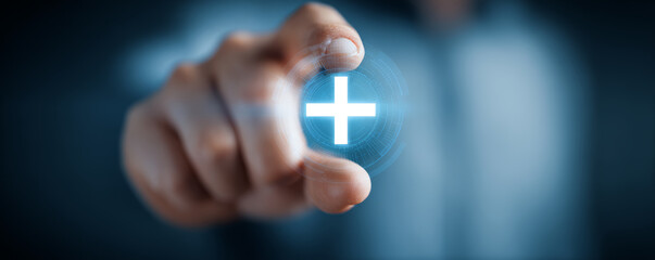 Digital plus sign touch human hand finger pointing blue background technology concept focus blur innovation interface connection growth digital