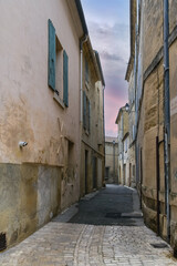 Obraz premium Uzes in France, old facades in the historic center, typical street 