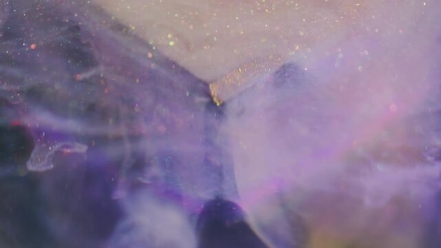 Shimmering art cloud. Blur sparkling flow. Colorful acrylic ink blob swirl mix on cube. Haze particles violet white rainbow fluid abstract background.