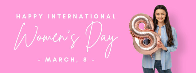 Fototapeta premium Young woman holds balloon and celebrates Women's Day joyfully