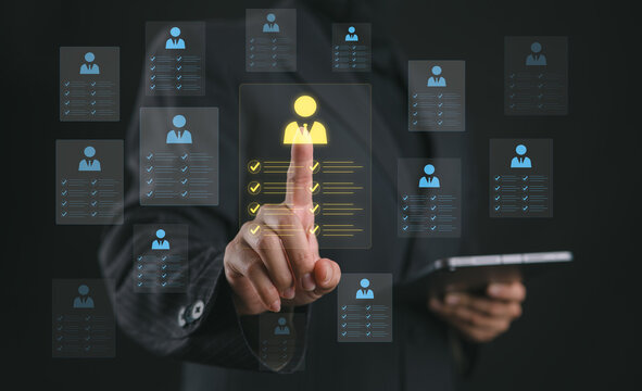 Digital recruitment concept with businesswoman selecting candidate profile on virtual interface, representing hiring technology, talent acquisition, and human resources management.