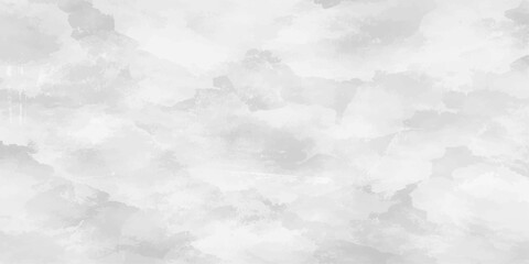 Fluffy white clouds drift across a bright blue summer sky, creating a beautiful natural texture in the clear atmosphere of a sunny day © ZT Stock Studio