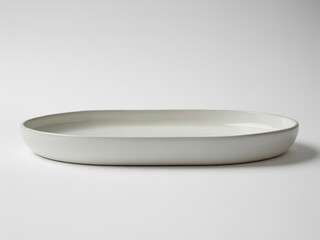 Minimalist Oval Plate for Elegant Dining and Culinary Presentation, Serving Food with Style in a Clean Studio Setting, Ceramic Dishware for Restaurants, Cafes, Home Kitchens, and Food Photography, Mod