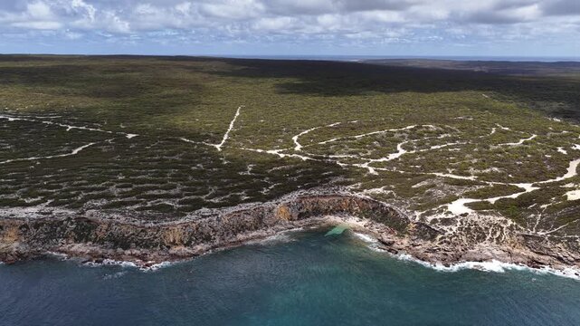 Pelamis Point, Sleaford, South Australia &ndash; 4K Aerial Drone Footage of Fishery Bay, rocky headlands, limestone cliffs, ocean waves, rugged Eyre peninsula coastline in Lincoln National Park.