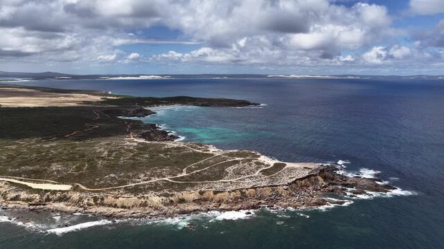 Pelamis Point, Sleaford, South Australia &ndash; 4K Aerial Drone Footage of Fishery Bay, rocky headlands, limestone cliffs, ocean waves, rugged Eyre peninsula coastline in Lincoln National Park.
