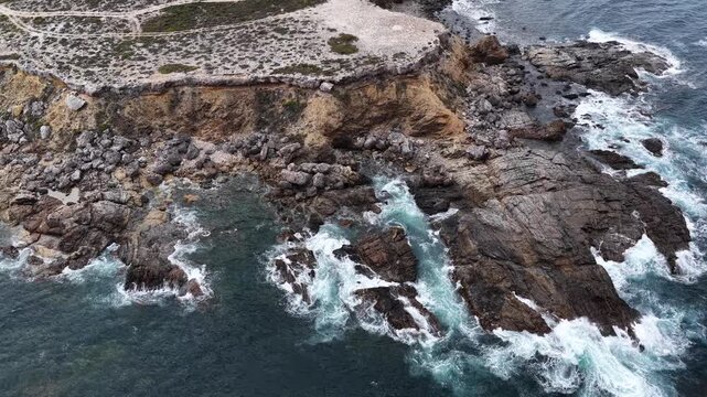 Pelamis Point, Sleaford, South Australia &ndash; 4K Aerial Drone Footage of Fishery Bay, rocky headlands, limestone cliffs, ocean waves, rugged Eyre peninsula coastline in Lincoln National Park.