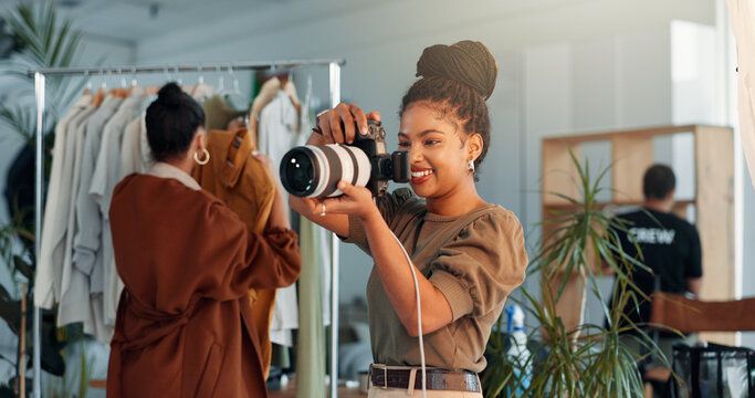 Woman, photographer or studio with camera crew, stylist or team for production or photoshoot. Female person, employee or smile with lens for creative agency, commercial business or marketing campaign