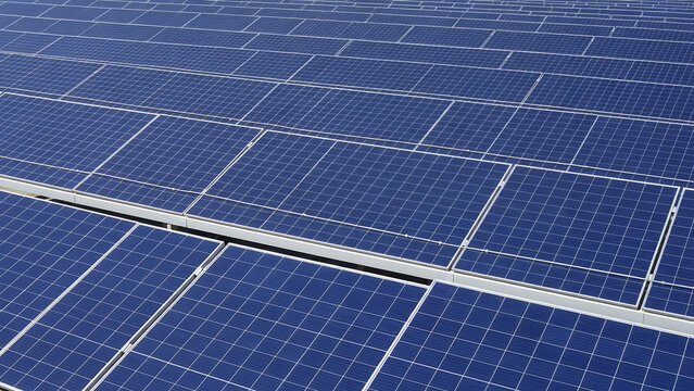 Aerial view of solar panels arranged in a grid on a rooftop, showcasing renewable energy technology