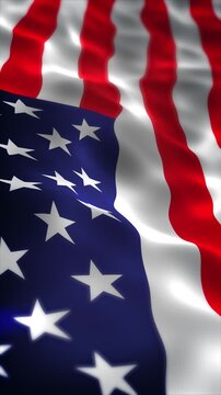 Vertical 9 16 orientation of the United States flag waving in the wind. High quality seamless loop animation optimized for mobile screens and patriotic social media holiday backgrounds.