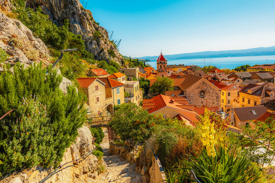 Omis old town and the Adriatic sea from the historic Mirabella fortress, terracotta roofs and the Cetina river in Croatia.