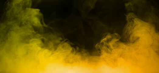 Naklejka premium Colorful smoke with yellow orange flare isolated on a black background. abstract neon gradient cloud with splash. thick swirling dust and powder creating a psychedelic light design. smog effect