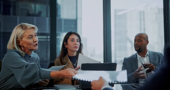 Team, business people and giving paperwork for strategy, agenda or talk in investment meeting. Conversation, planning and hand out document with group in office for finance budget, proposal or report