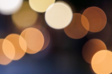 温かい灯りの抽象イメージ　丸ボケのテクスチャ素材