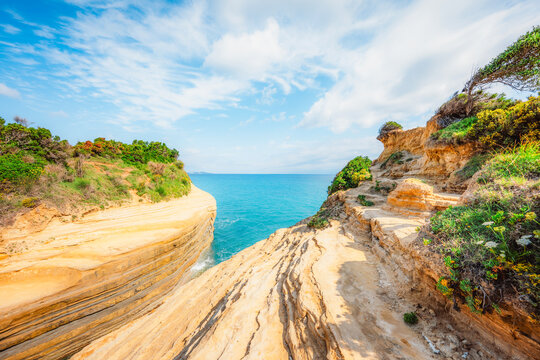 Cape Drastis, natural landscape with white rocks and turquoise waters, northern part of Corfu island, Ionian islands of Greece