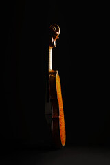 Leandro Biaggi master violin on dark background, luxury classical string instrument close-up, Italian craftsmanship concept