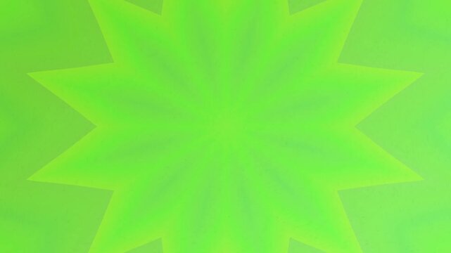 Bright green starburst pattern on vibrant background.