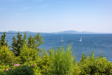 View of sailboats on the Atlantic Ocean off the coast of Maine © Cavan