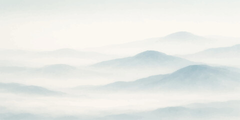 A misty mountain landscape unfolds as soft clouds and fog drift over snow-capped peaks at sunrise, revealing a breathtaking nature view of a forest valley beneath a glowing blue winter sky © MDNUR