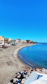 vertical video of beautiful spanish beach and city landscape, costa tropical, Spain