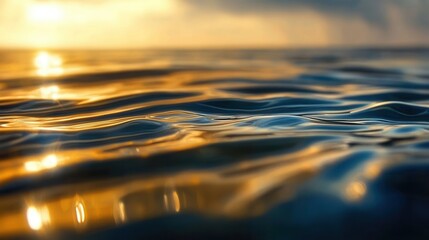 Rippling waterline in golden light at sunset revealing the beauty of nature and the movement of water