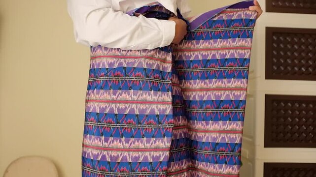 close up of a Muslim wearing a sarong