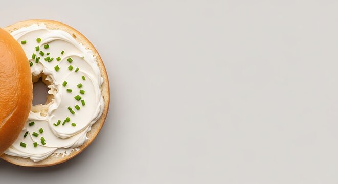 tasty bagel with cream cheese and chives